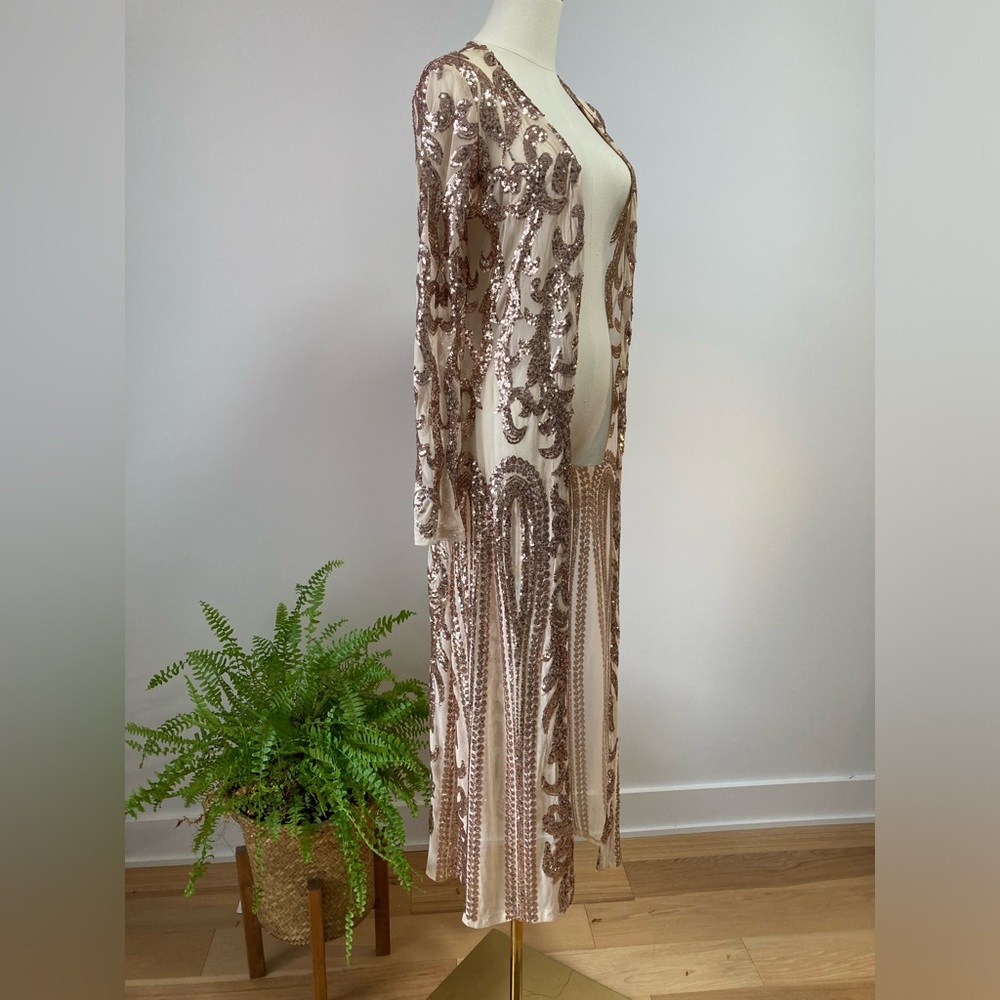 Moonlite tunic perfect for special occasion. I wear w/ all black/white under